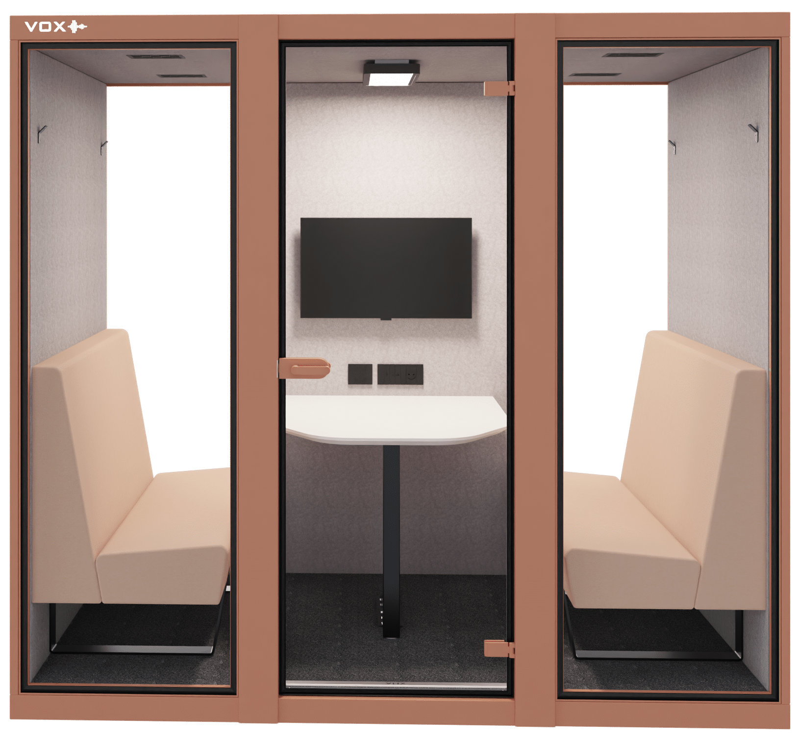 akoestische cabine met daarin treinbanken in een bruinroze tint, in het midden staat een tafel met daarboven een tv-scherm.