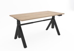 Y-poot bureau met zwart onderstel en licht houten blad.
